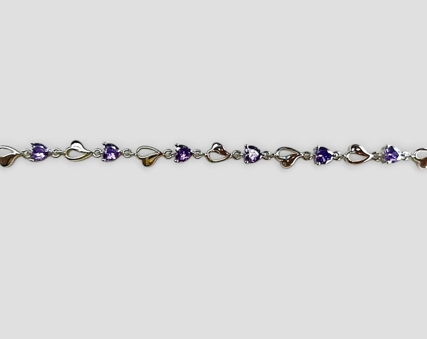 BRACCIALE CASCATA DI CUORI E LUCE VIOLA ARGENTO