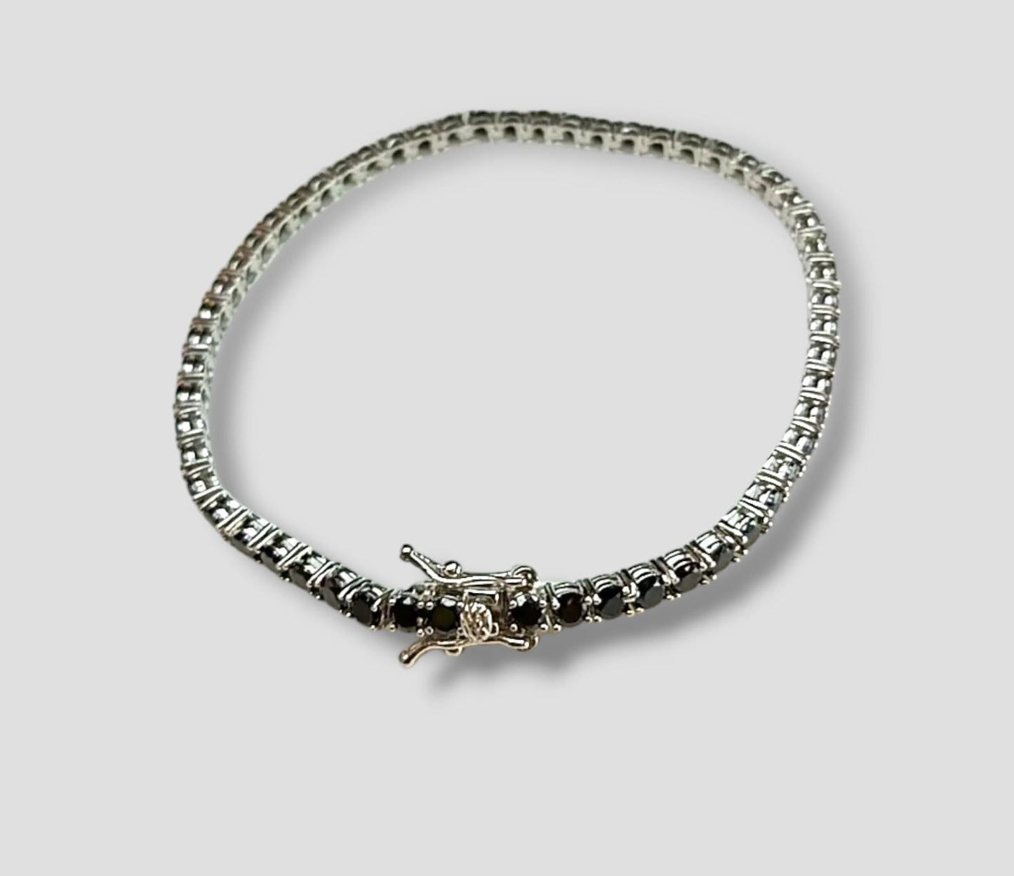 BRACCIALE TENNIS PIETRE NERE ARGENTO