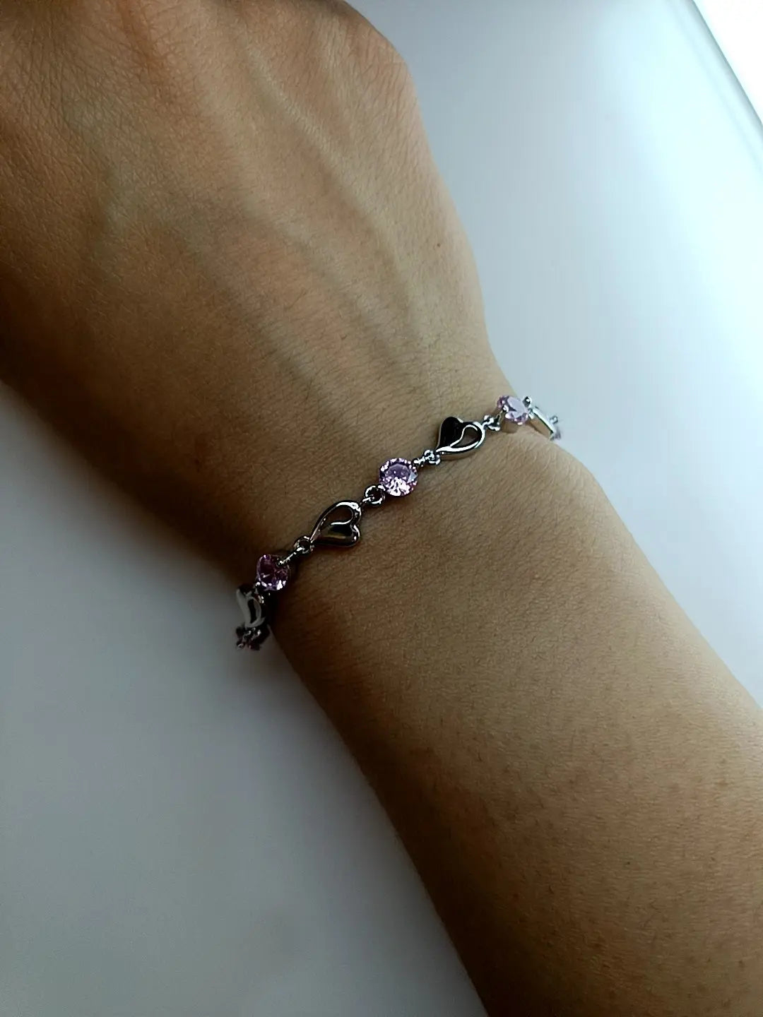 BRACCIALE CASCATA DI CUORI E LUCE ROSA ARGENTO