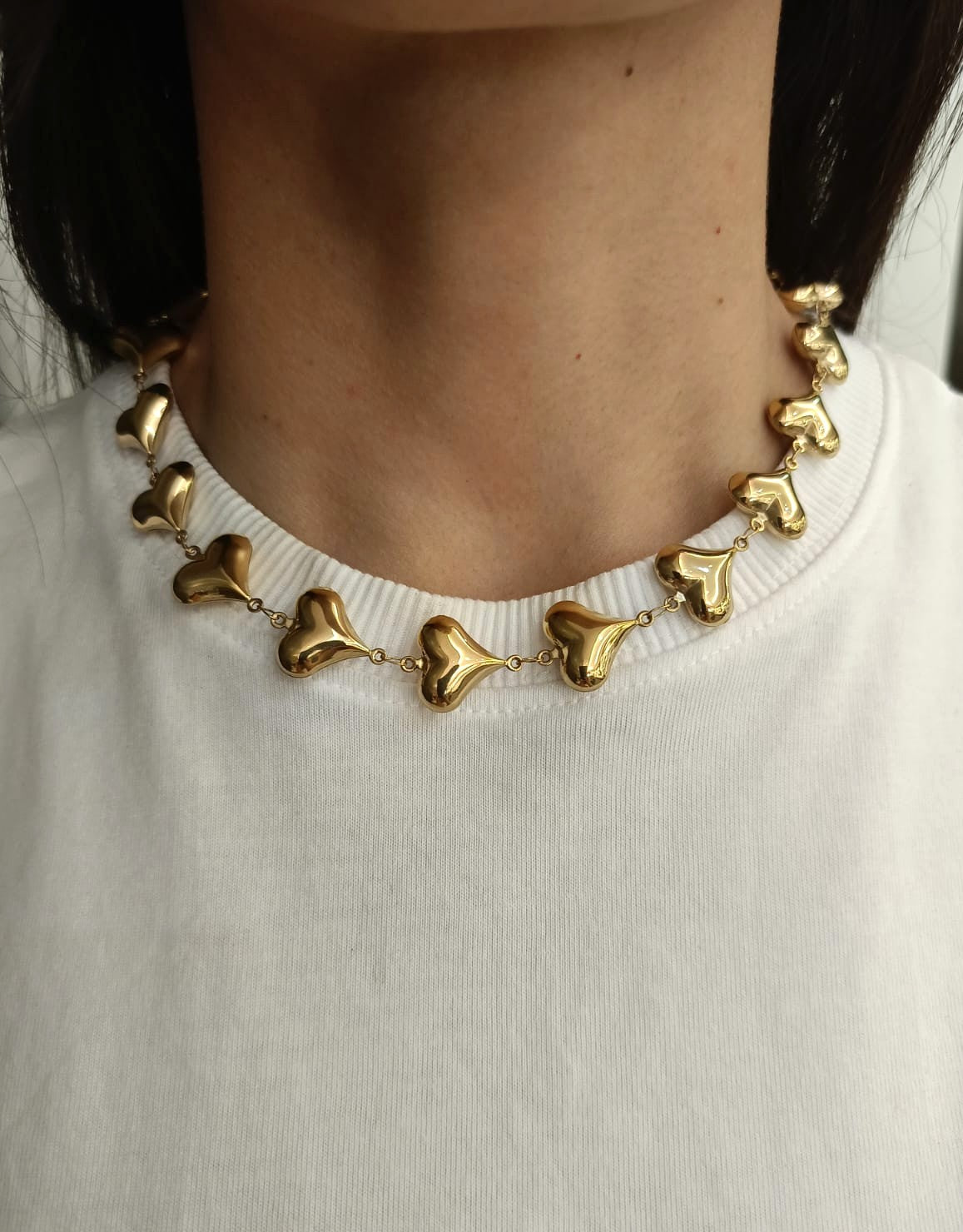 Collana cascata di cuori con sonaglio